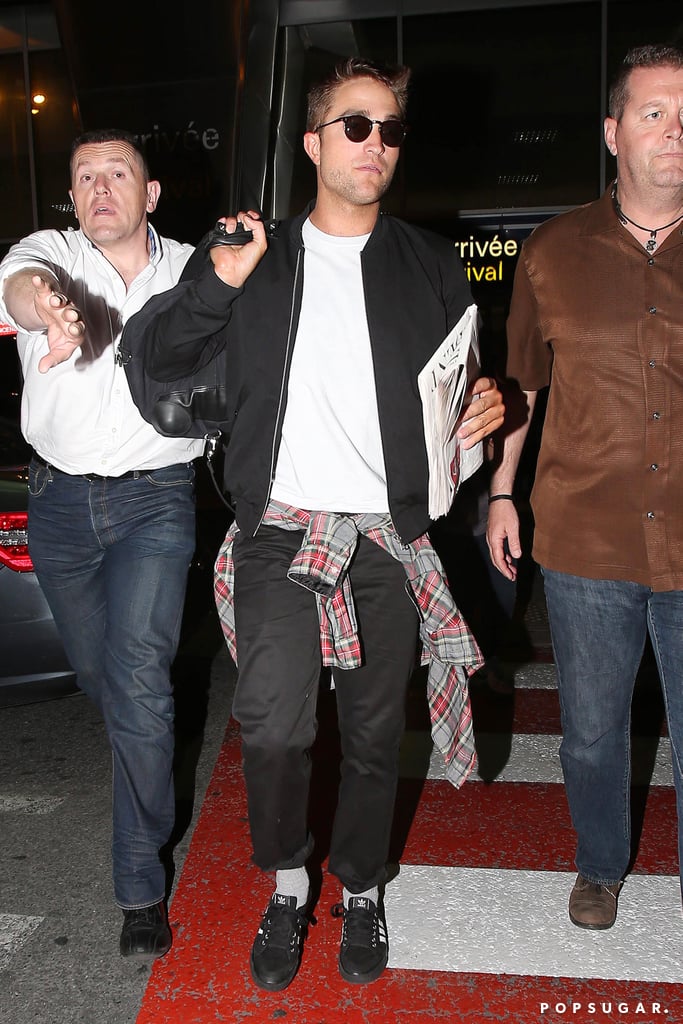 Robert Pattinson Arrives at the Cannes Film Festival 2014
