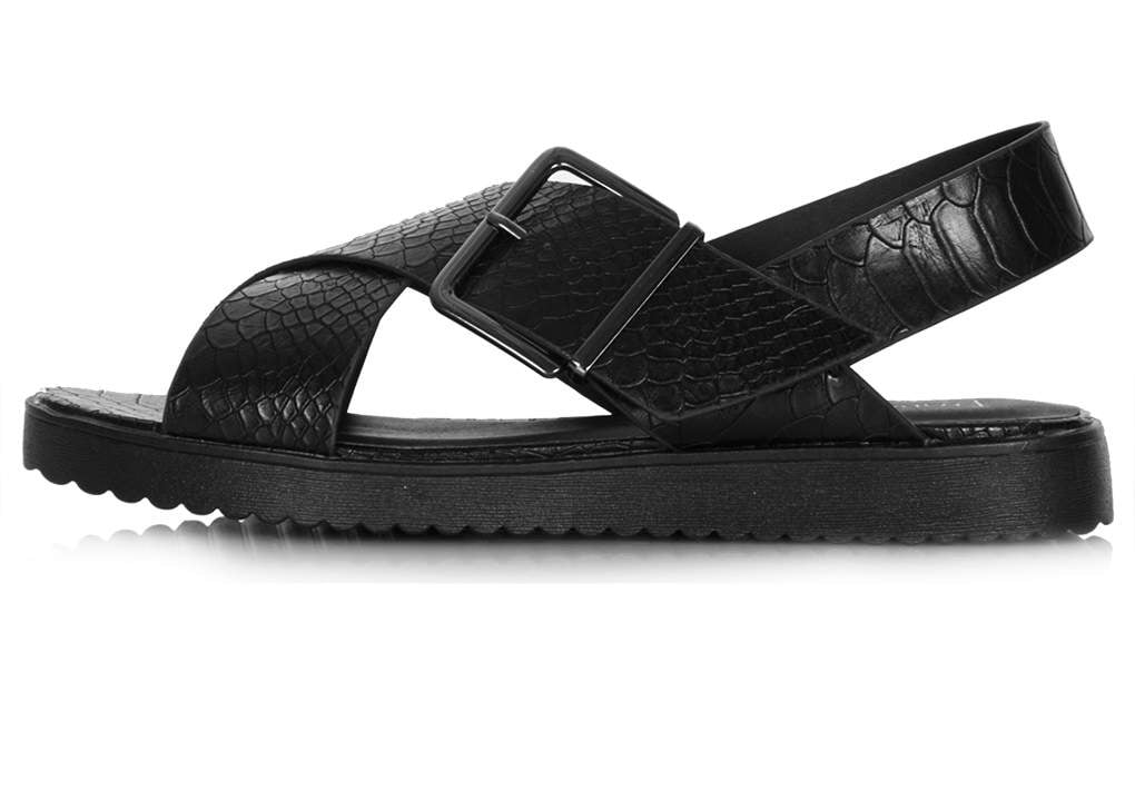 Topshop Hola black cross-buckle flat sandals ($40)