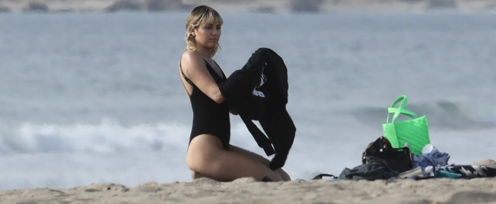 Miley Cyrus's Black Swimsuit With Logo Straps at the Beach