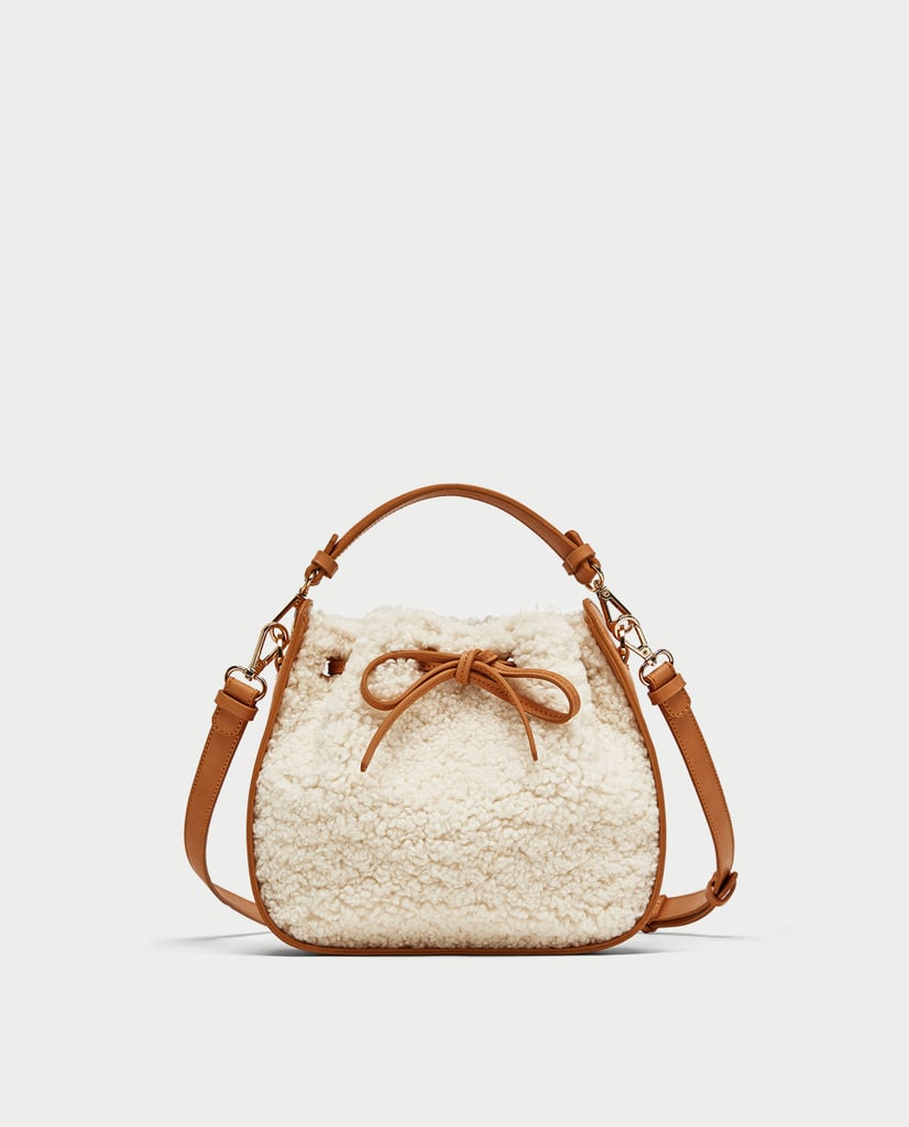 Dip your toe in the trend with this budget-friendly Zara Faux Fur Mini Bucket Bag ($50).