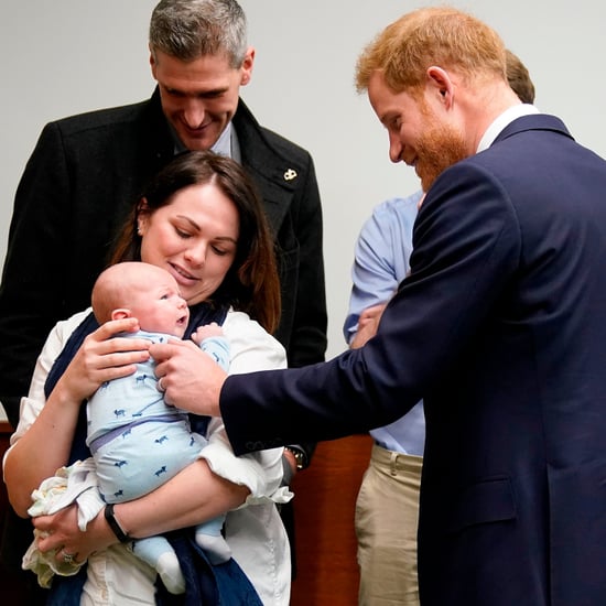 Prince Harry Meeting a Baby at Queen Elizabeth Hospital 2019