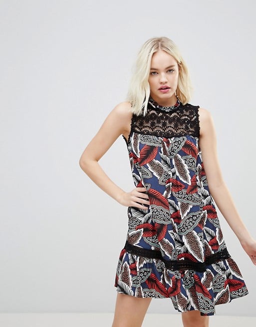 Hazel Leaf Printed High Neck Dropped Hem Dress With Lace Yolk