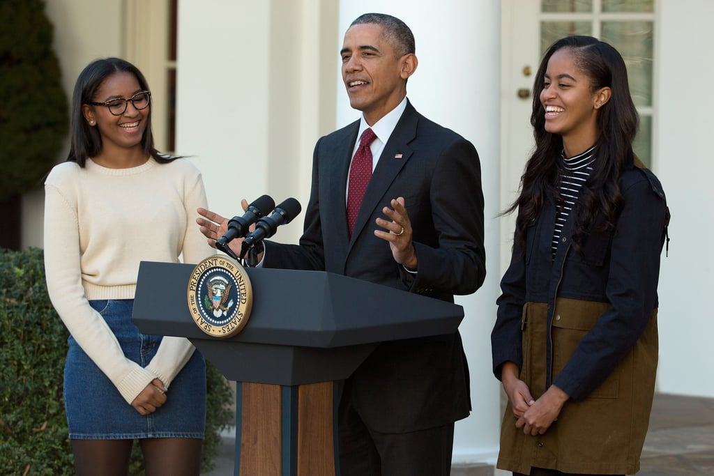 The girls couldn't help but smile over their dad's jokes at the annual turkey pardoning ceremony in November 2015.