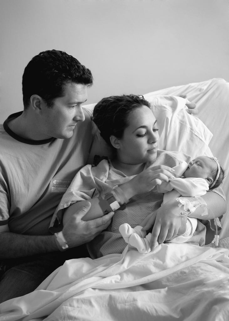 mom dad and baby photography