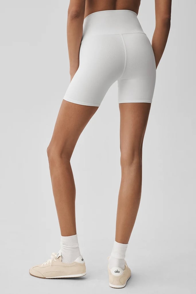 Alo Yoga 5" Airbrush High Waist Biker Short ($78)
When it's too hot for a pair of leggings but you still want to wear something formfitting, these Alo Yoga biker shorts are a must. They're constructed out of a material that resists odors and sweat and is equipped with four-way stretch to give you full range of motion while you work out.