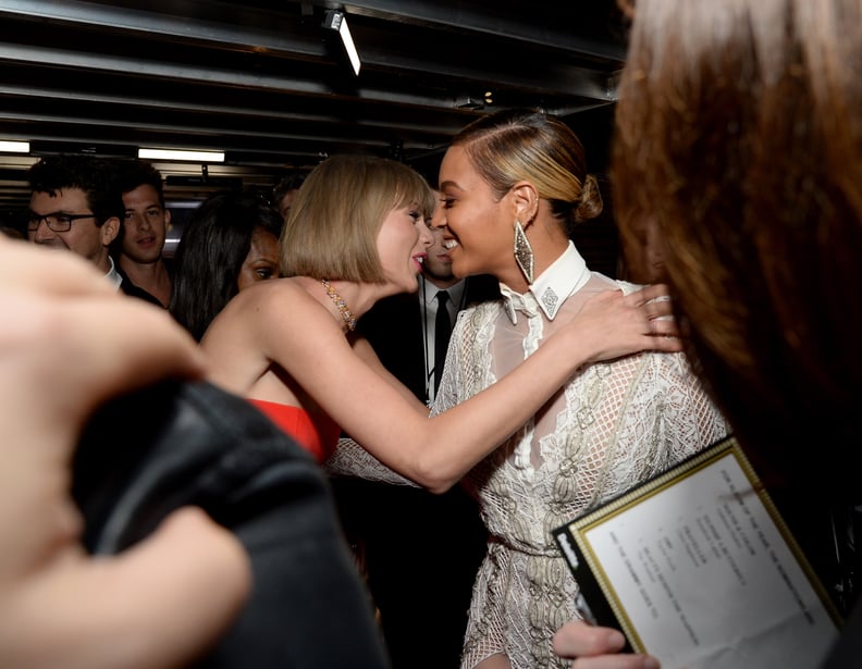 Taylor Swift's huge, goofy grin was almost bigger than Miley's.