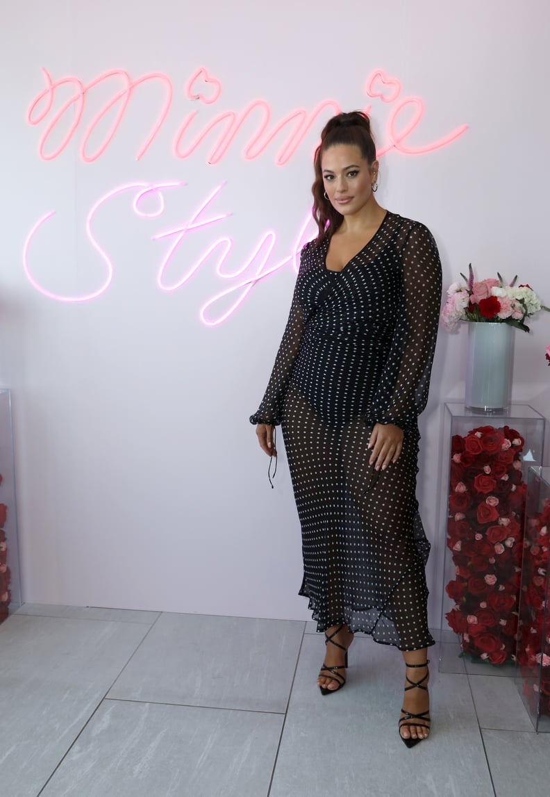 Ashley Graham at a NYFW Event in a Sheer Polka-Dot Dress