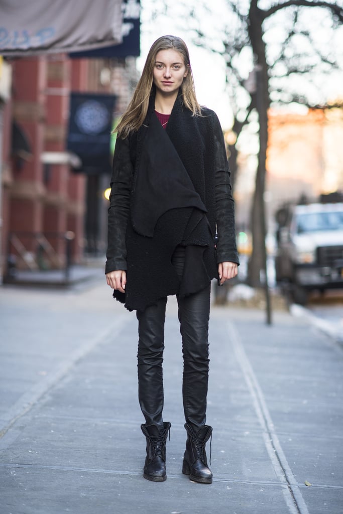 Sure, it's simple, but this all-black look scores points with a little leather and a pair of tough-girl boots. 
Source: Le 21ème | Adam Katz Sinding