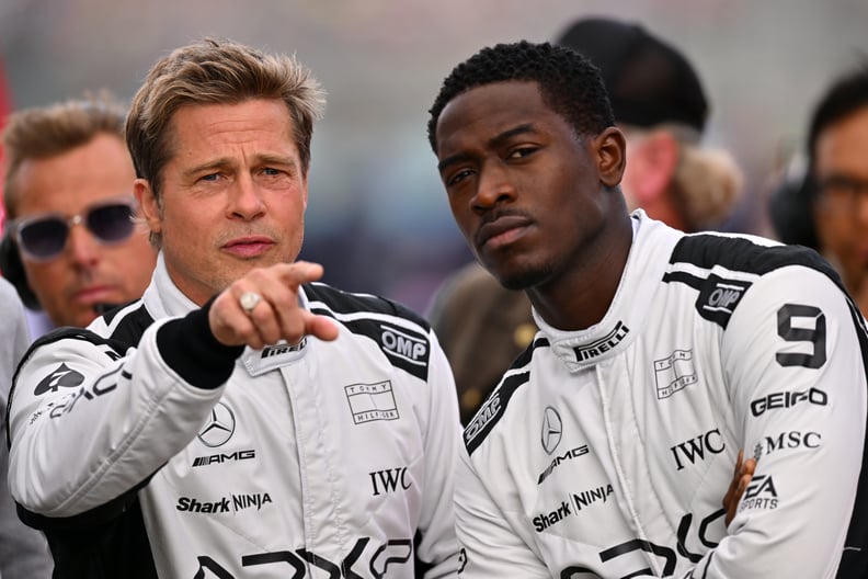 NORTHAMPTON, ENGLAND - JULY 09: Brad Pitt, star of the upcoming Formula One based movie, Apex, and Damson Idris, co-star of the upcoming Formula One based movie, Apex, look on from the grid during the F1 Grand Prix of Great Britain at Silverstone Circuit 