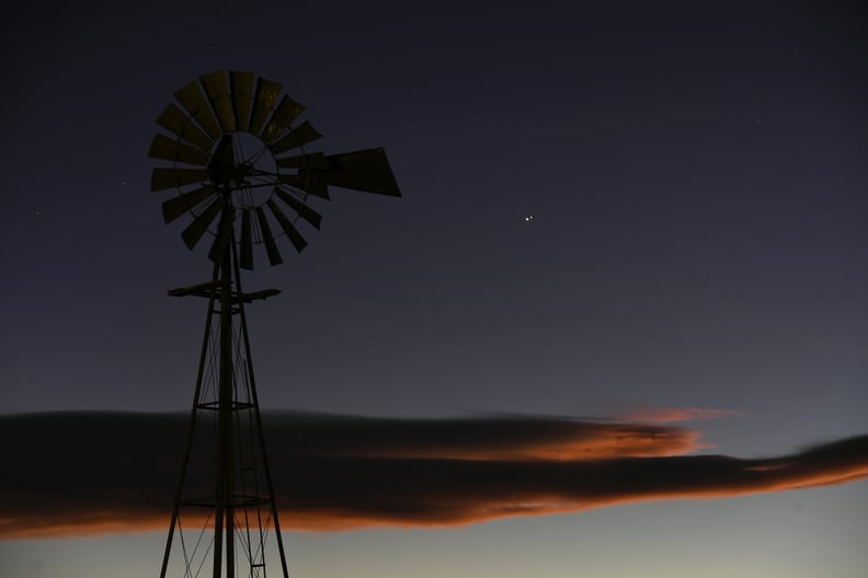 BERTHOUD, COLORADO - December 21:  Framed by a large windmill Jupiter and Saturn align for the first time in 800 years on December 21, 2020 in Berthoud, Colorado. Jupiter and Saturn are about to appear closer in the sky than they have in 800 years. The tw