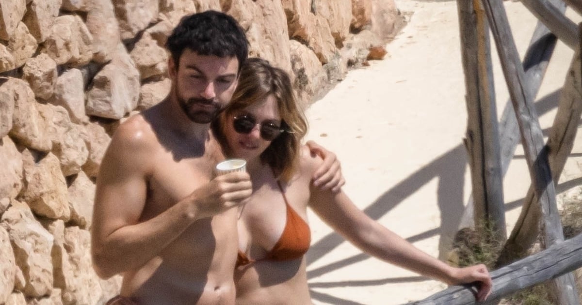 Elizabeth Olsen and Husband Robbie Arnett Get Cozy in New Vacation Photos