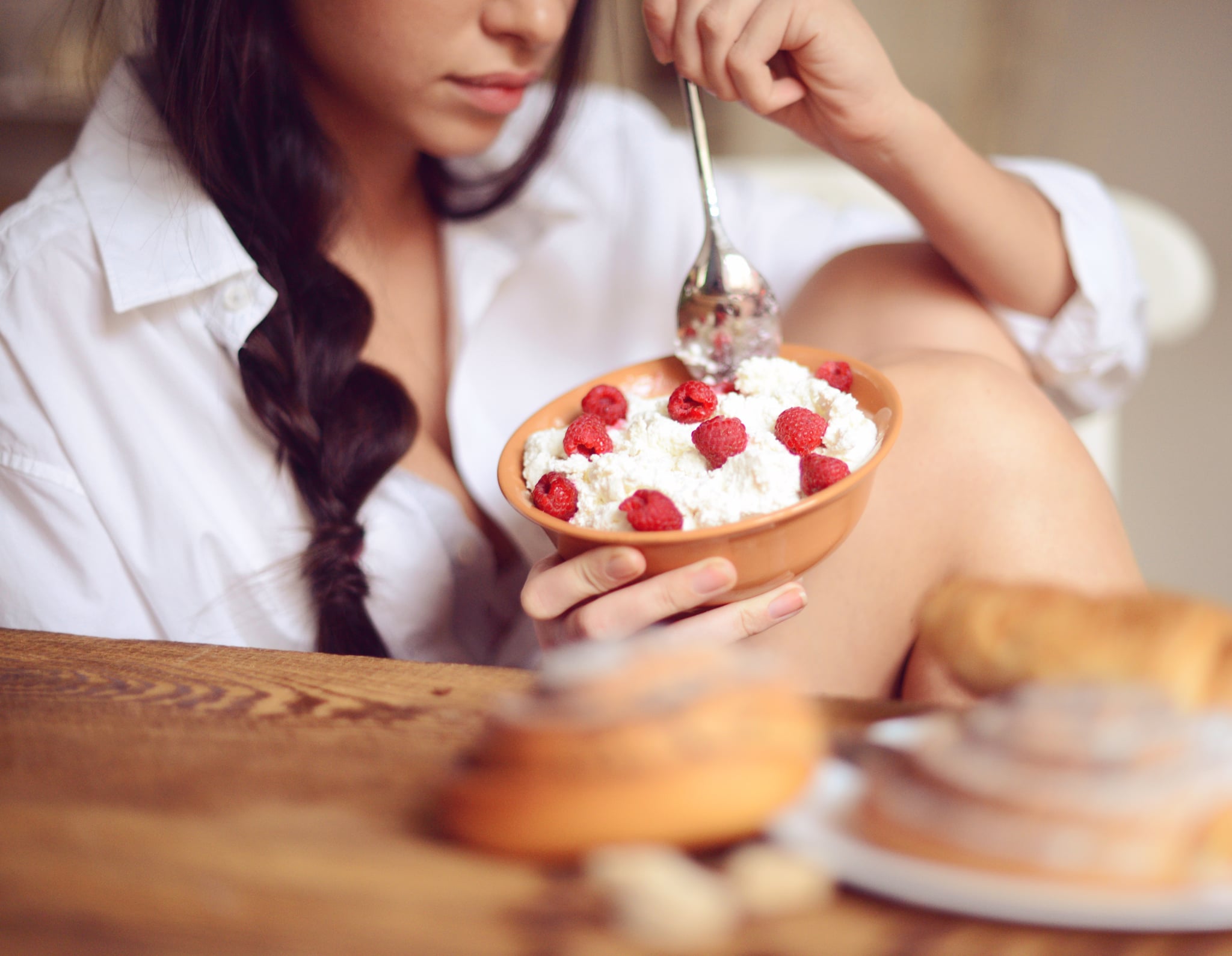 young woman having breakfast