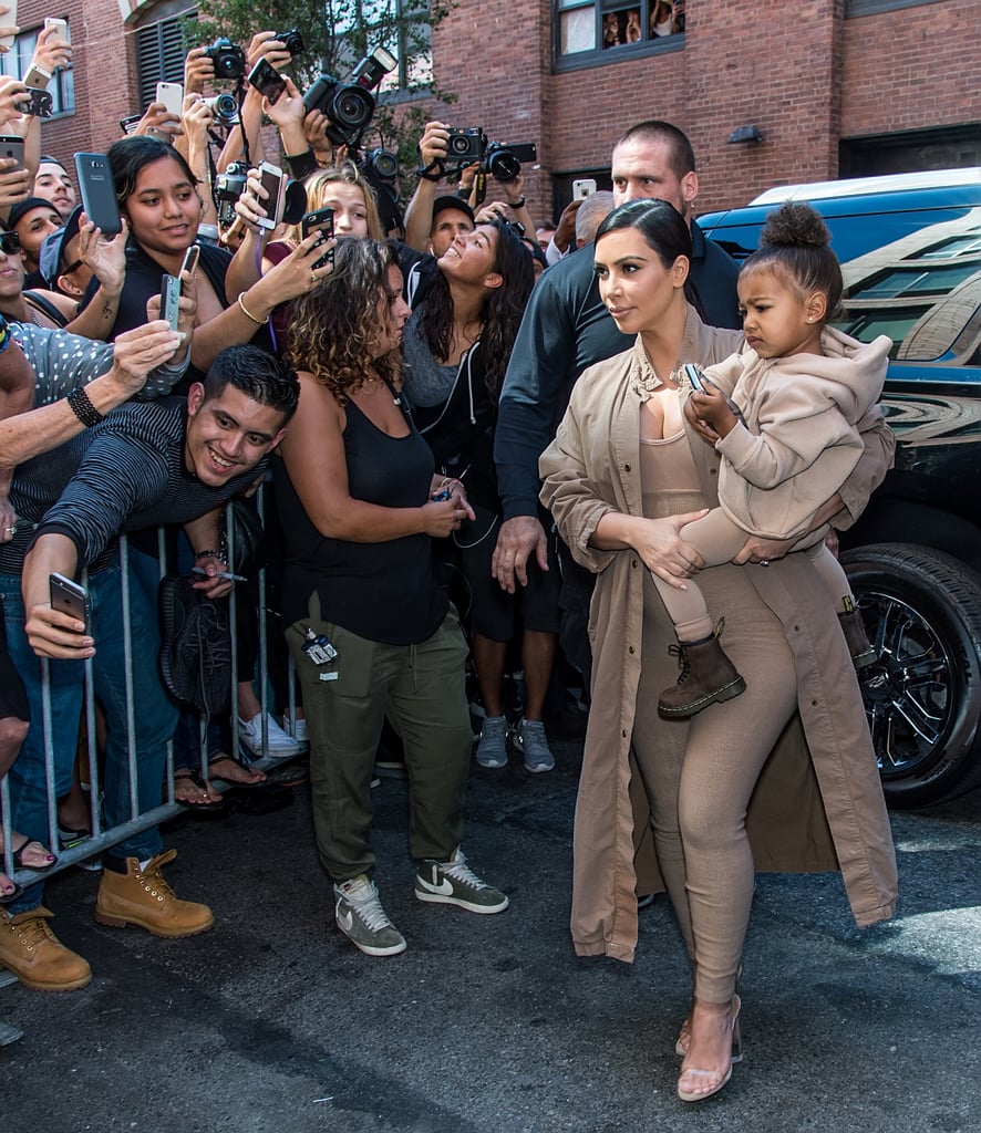 Kim and North coordinated their looks for the Yeezy show, arriving to the fashion party in sand-colored separates.
