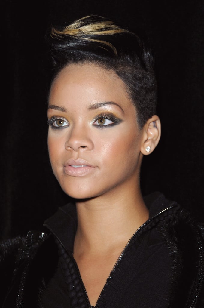At a Givenchy fashion show in 2009, Rihanna selected a pale, shimmery beige lip color that came close to matching her concealer. This muted look allowed her bold eye makeup to truly shine!