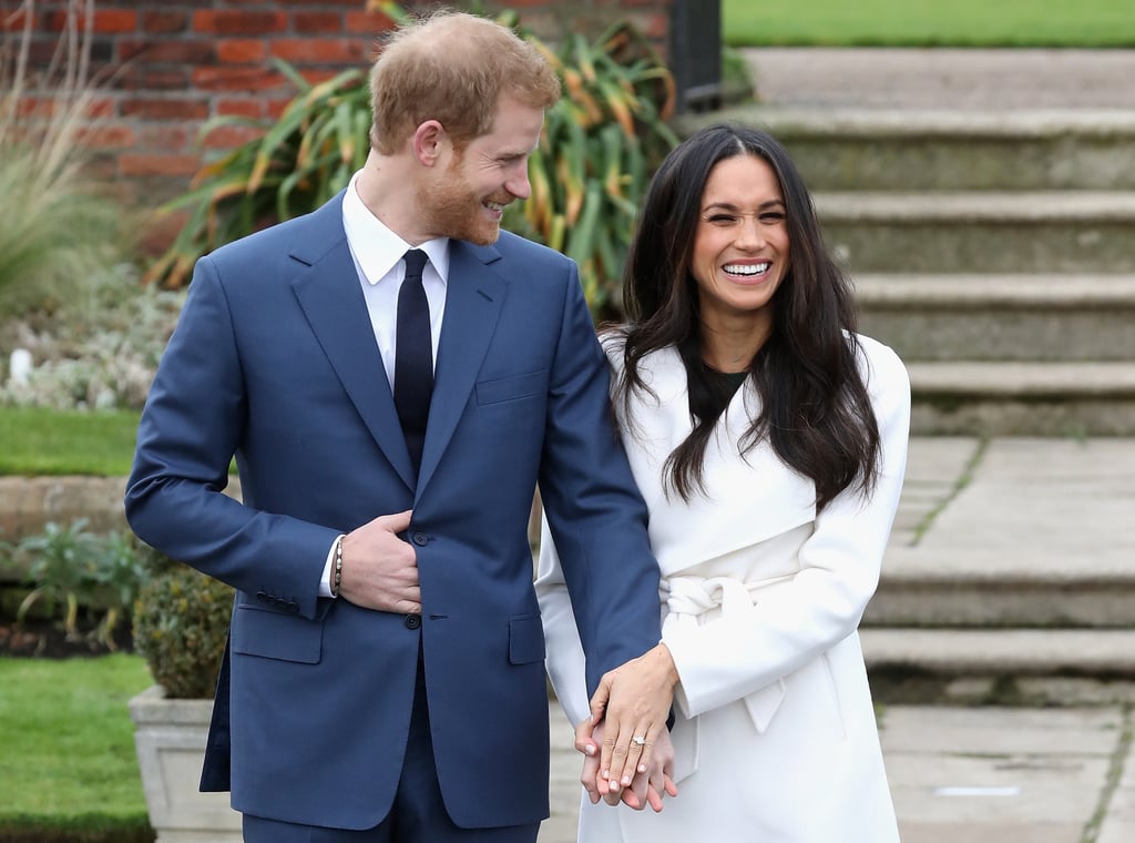 Meghan proudly showed off her gorgeous engagement ring, complete with three giant stones, while smiling from ear to ear alongside her husband-to-be. I mean, wouldn't you be as giddy as a schoolgirl if your man personally designed a ring like that just for you?
