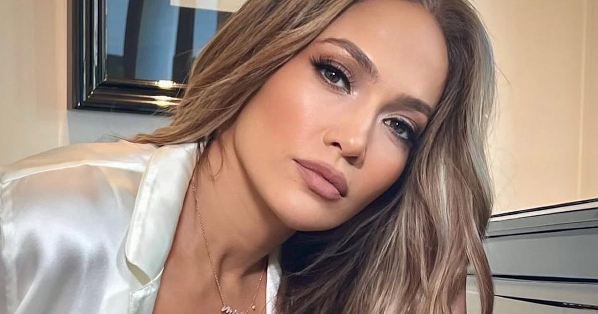 J Lo Poses For Intimissimi in Black Bra and White Satin PJs