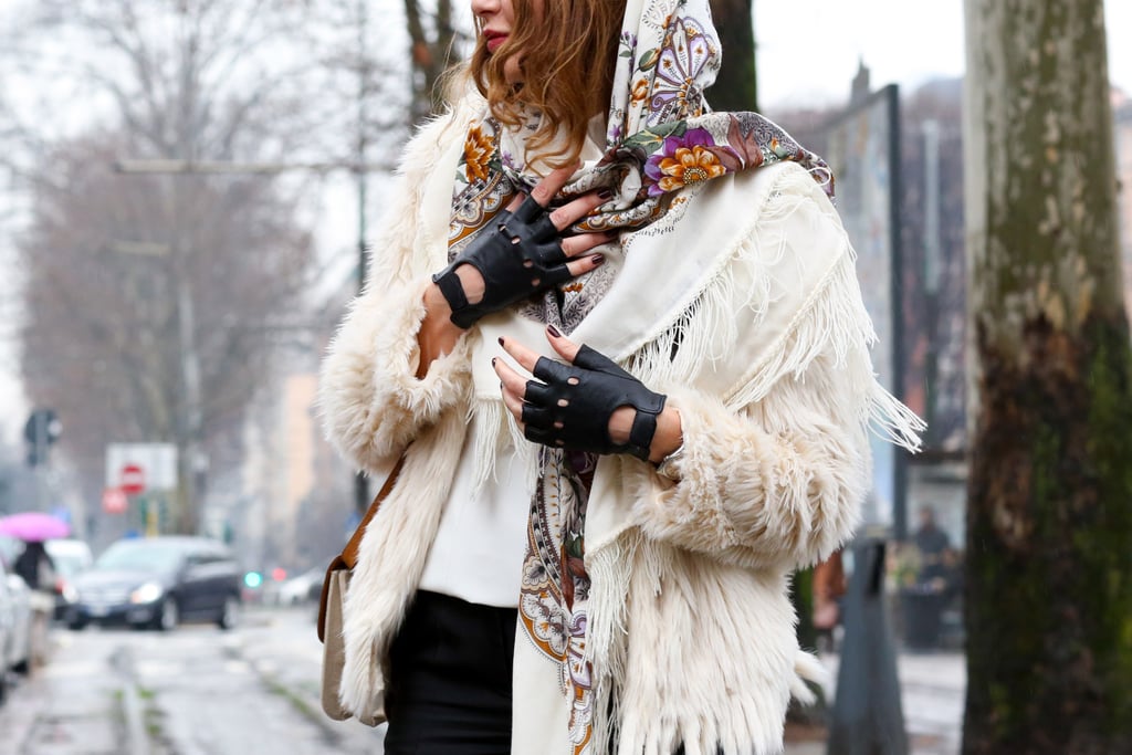 Badass biker gloves and a pretty scarf go surprisingly well together.