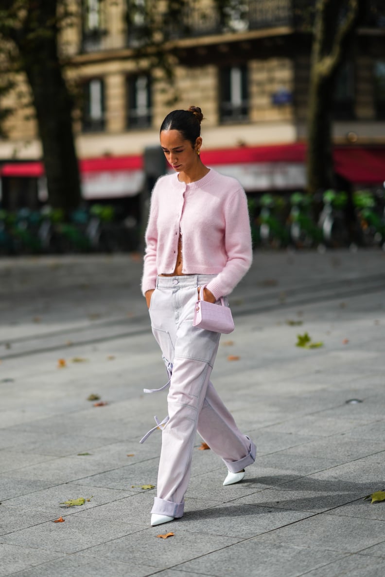 Style jeans with a sweet cardigan and coordinating handbag.