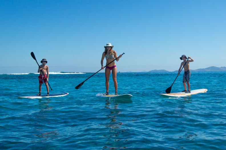 Wende paddleboarding with her sons in Fiji
