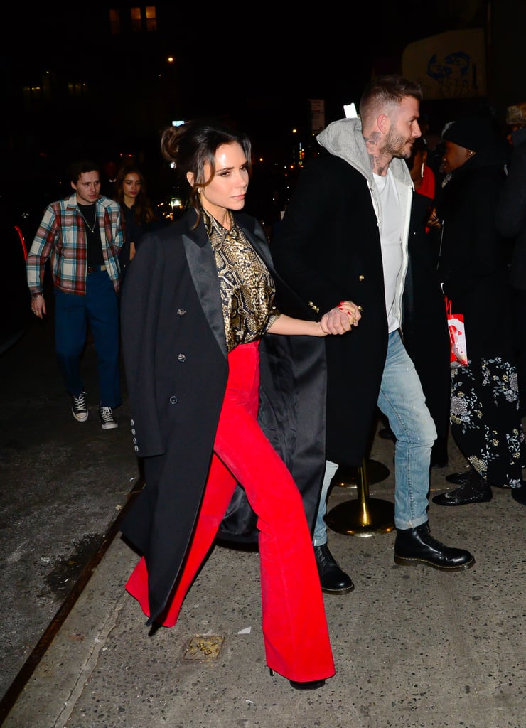 Victoria Beckham Red Pants and Snakeskin Blouse January 2019