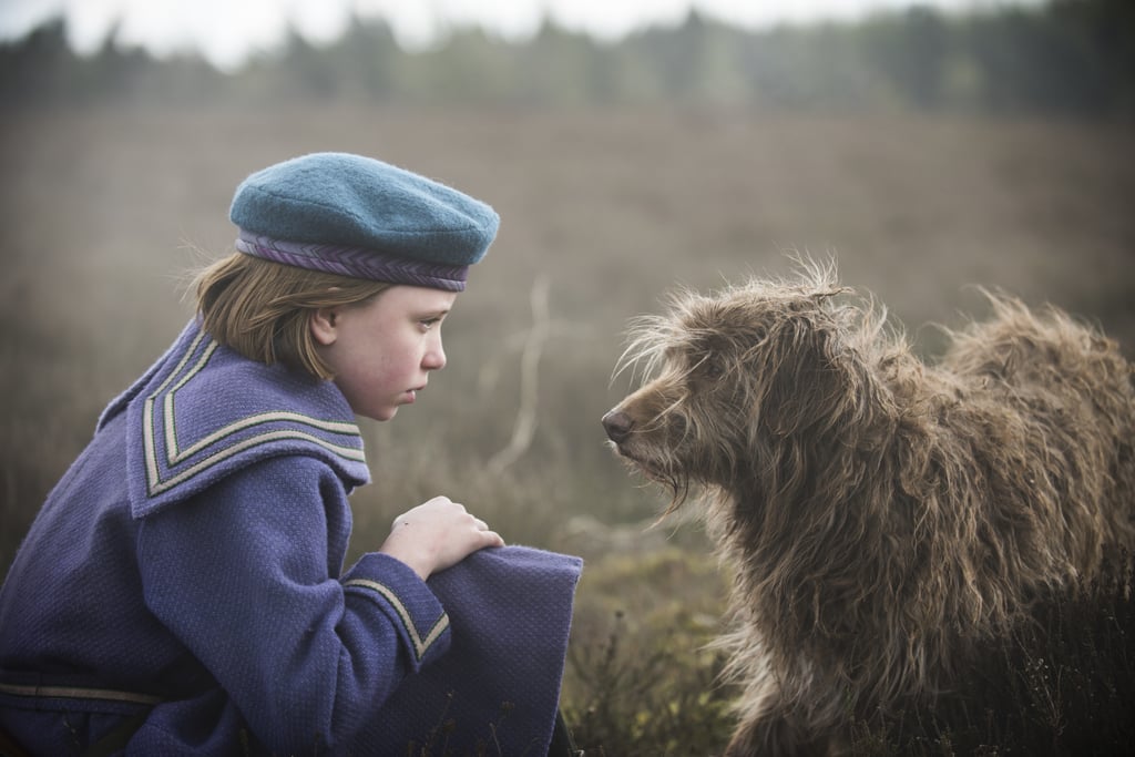 5. There's a positively delightful dog in this adaptation.
Far and away one of the sweetest arcs in the film involves a stray dog whom Mary names Jemima. Prone to feeding him meat from her sandwiches, Mary finds a fast friend in the pup after she frees her from a bear trap on the moor. Later on, Mary learns that Jemima is actually a boy. By that point, she and her friends have developed such close relationship with the dog, they put their heads together to come up with a more fitting name, Hector.
6. The Secret Garden shows how powerful friendship can be.
The biggest takeaway from The Secret Garden is the power of friendship. As Mary becomes nicer, she attracts more friends, who eventually experience the magic of the secret garden together. Additionally, the movie showcases how much fun therE is to have in nature as long as you have a few buddies by your side!