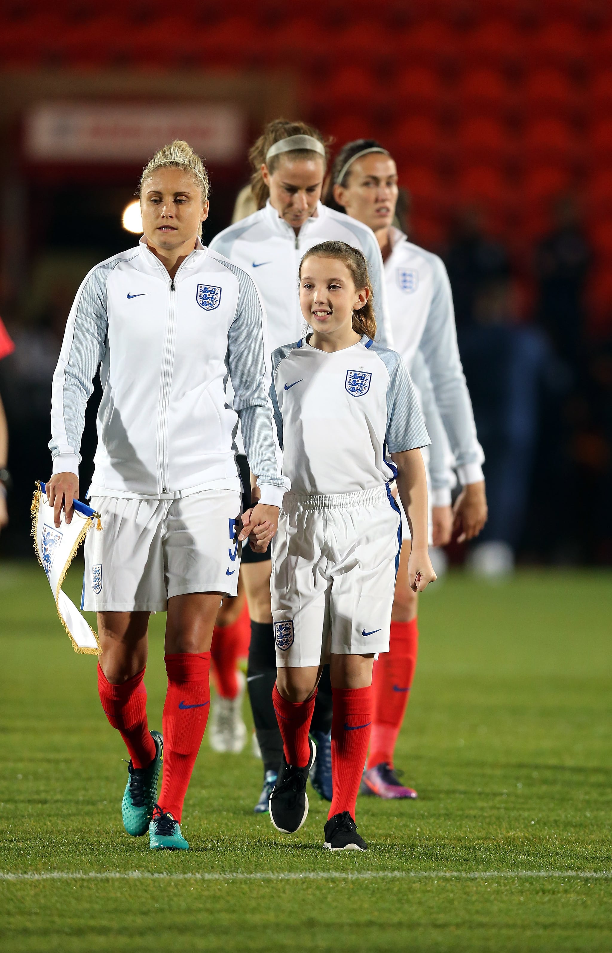 DONCASTER, ENGLAND - OCTOBER 21:  Mascots ahead of the Women's International Friendly match between England and France at Keepmoat Stadium on October 21, 2016 in Doncaster, England.  (Photo by Nigel Roddis - The FA/The FA via Getty Images)