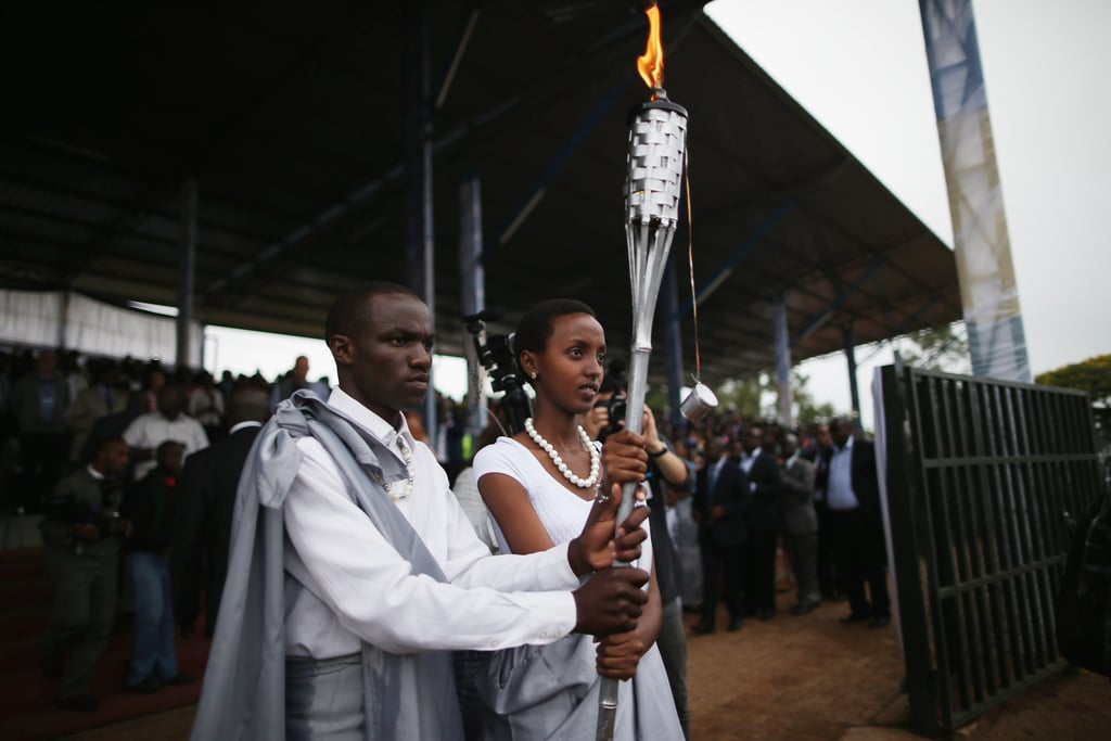 Torchbearers carried the Kwibuka Flame of Remembrance in the city of Kigali on April 5. The flame's journey would end at Kigali's national genocide memorial today.