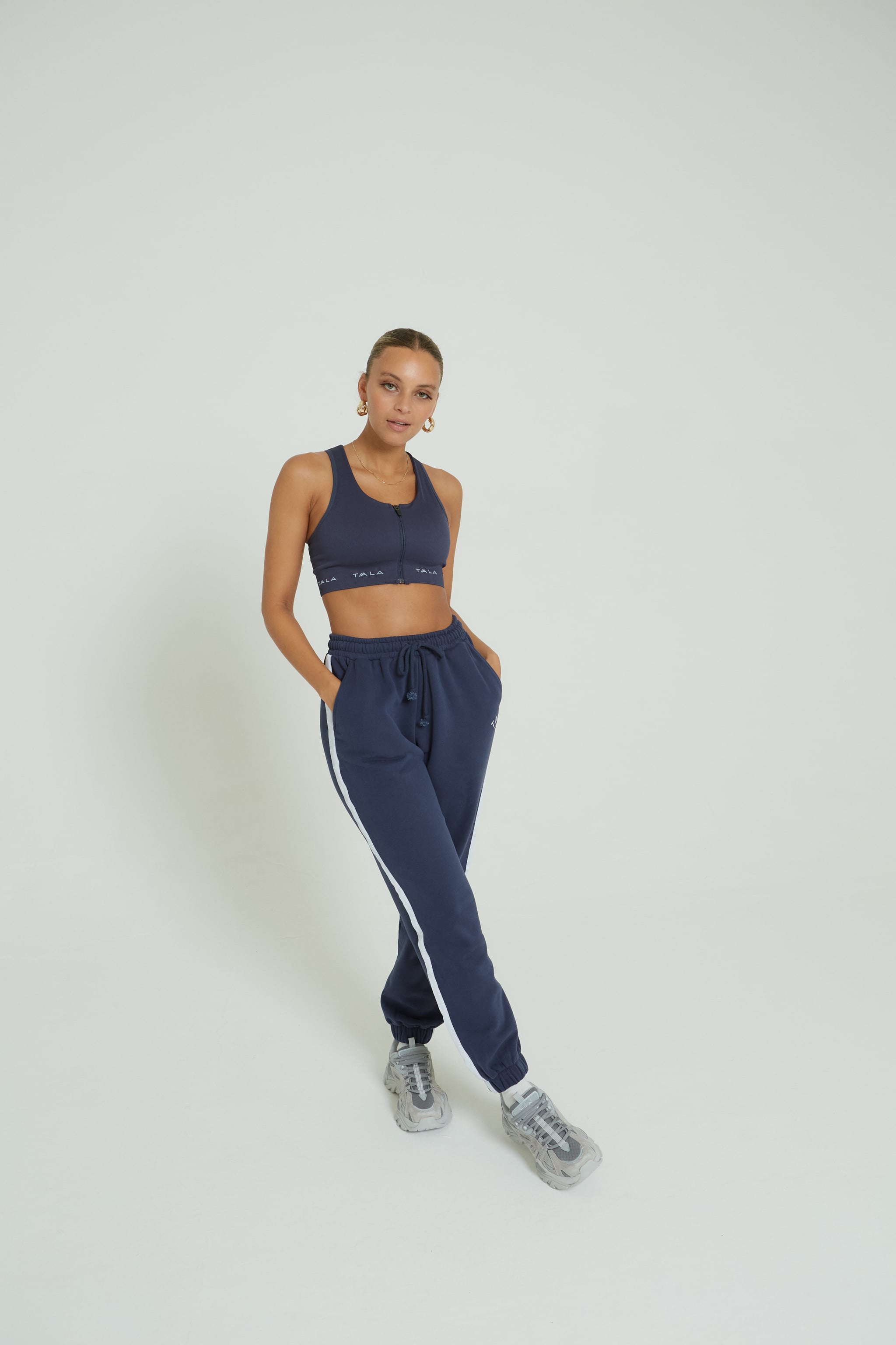 Tala Ixia Court Seamless Zip Sports Bra & Dusk Side Stripe Joggers, You'll  Want To Live in Tala's New Vintage-Inspired Court Collection All Autumn  Long