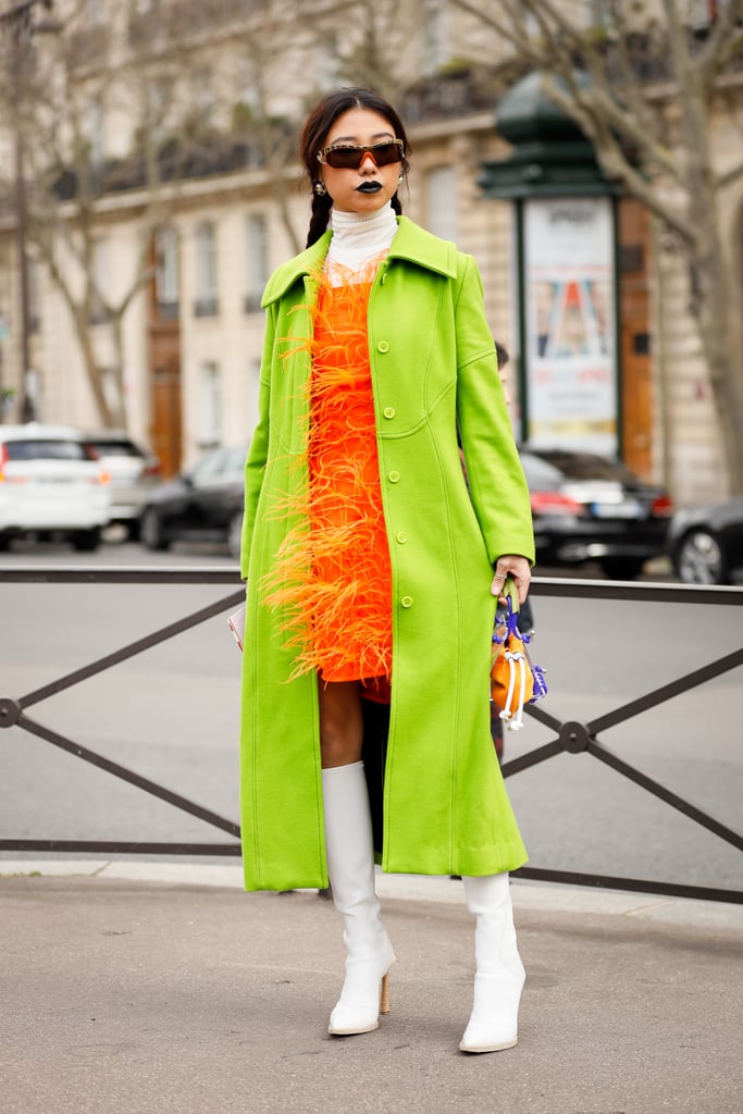 Wearing a layer of neon over another color is a cool way to add pizzazz to a look. You don't have to go neon on neon — you could just do a neon cardigan or jacket.
