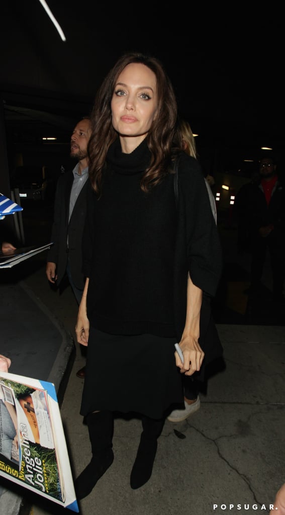 Angelina Jolie Wearing Black Suede Boots