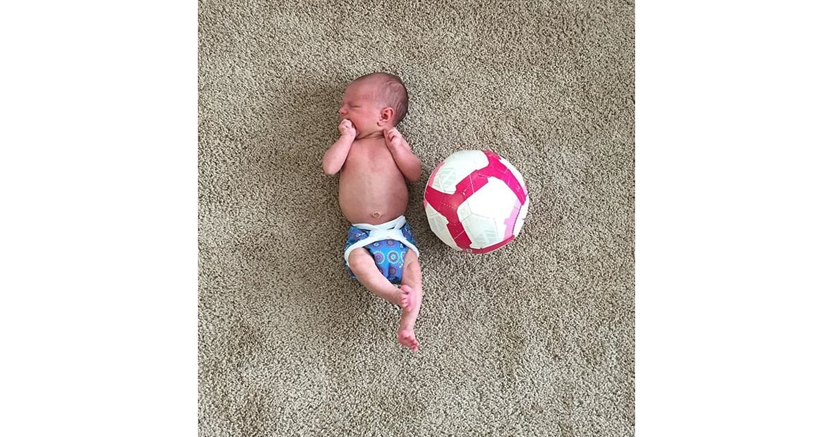 Baby vs. soccer ball. WeeBabyVs Instagrams of Tiny Baby With
