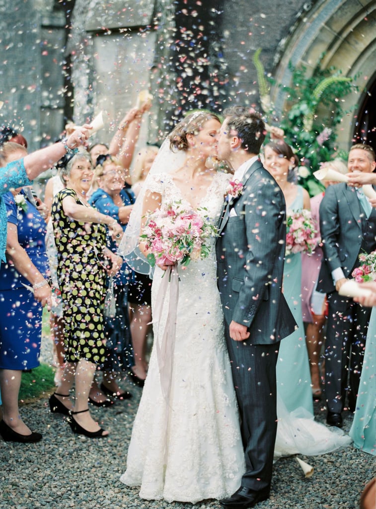 Even Colorful Confetti Can't Hide the Dainty Blossoms on This Bride's Dress