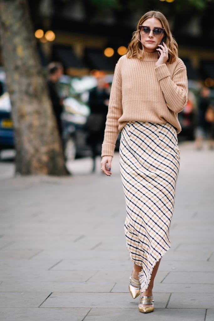 A Beige Jumper, Maxi Check Skirt, and Gold Heels