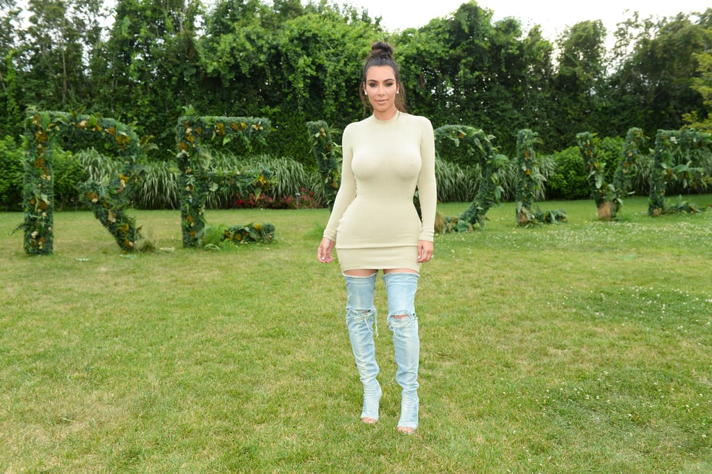 Kim Wore Her Denim Over-the-Knee Boots With a Sweater Dress While at a Revolve Event
