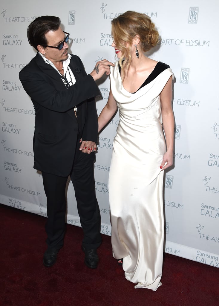 Johnny Depp and Amber Heard at the Art of Elysium Gala 2015