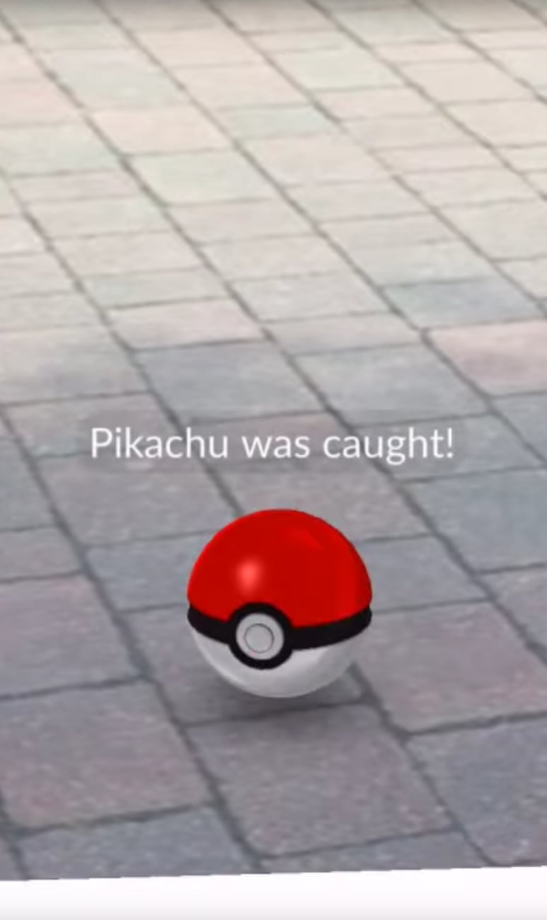 Throw the Poké Ball onto Pikachu's head, and catch him!