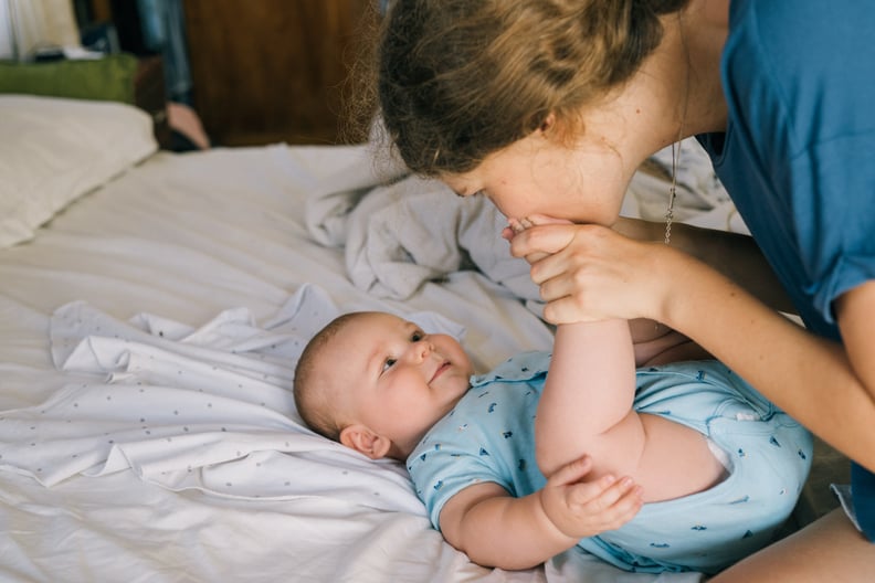 tmp_OXAUVF_2c6ebd90540d3599_photo-of-woman-kissing-baby-s-feet-4668998.jpg