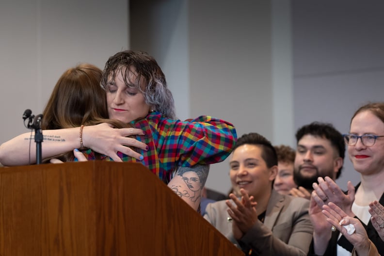 Rep. Leigh Finke, DFL-St. Paul, author of the trans refugee bill hugged Lt. Gov. Peggy Flanagan