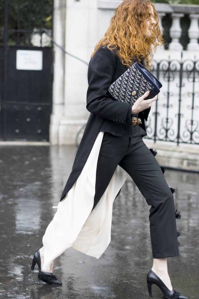 Tuck it away under your arm, but maybe not entirely. How to Wear a