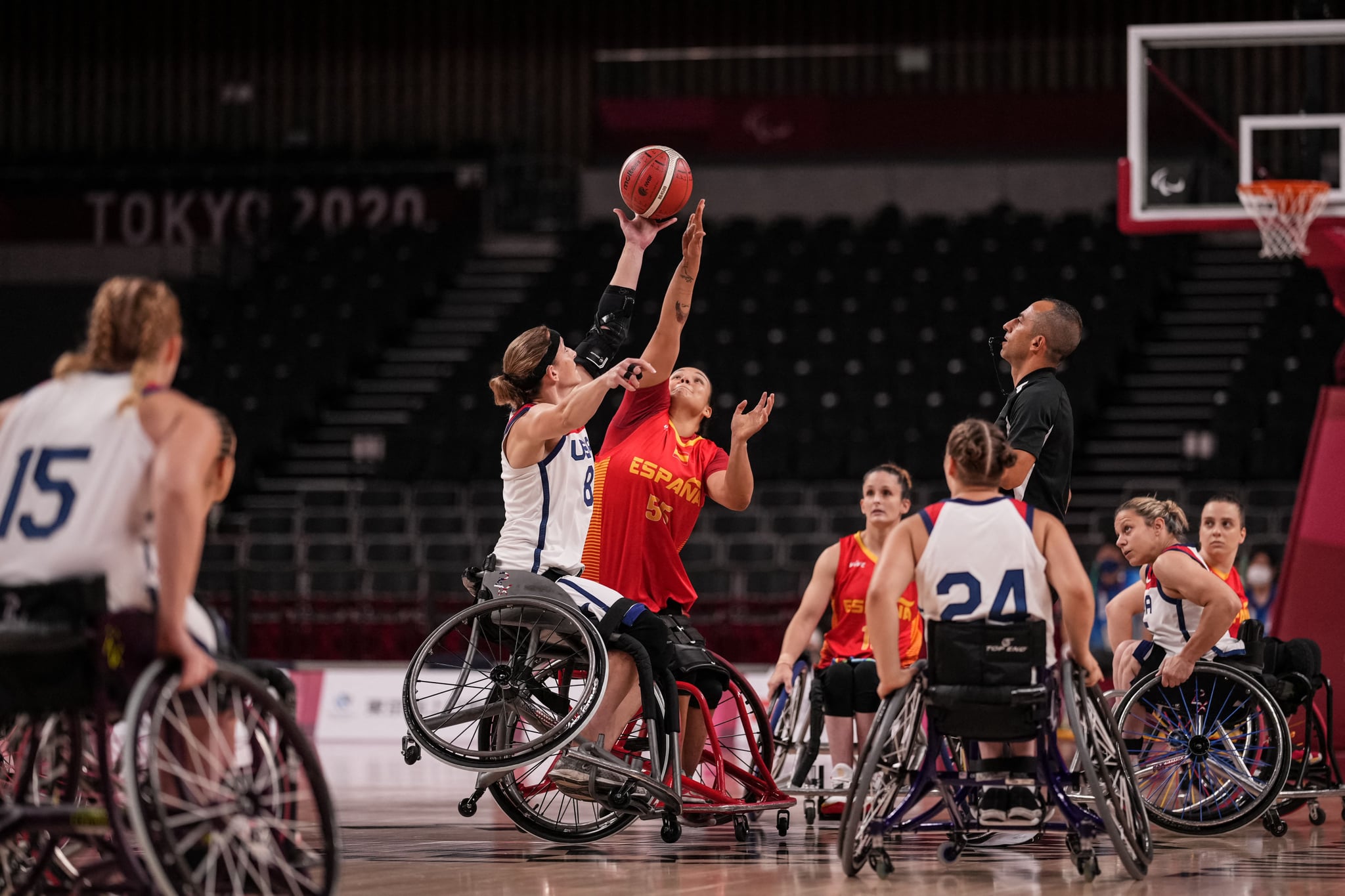 USA's Courtney Ryan (L) and Spain's Isabel Lopez Chavez reach for the ball during the women's wheelchair basketball preliminary round group B match between USA and Spain at the Tokyo 2020 Paralympic Games at Ariake Arena in Tokyo on August 26, 2021. (Photo by Yasuyoshi CHIBA / AFP) (Photo by YASUYOSHI CHIBA/AFP via Getty Images)