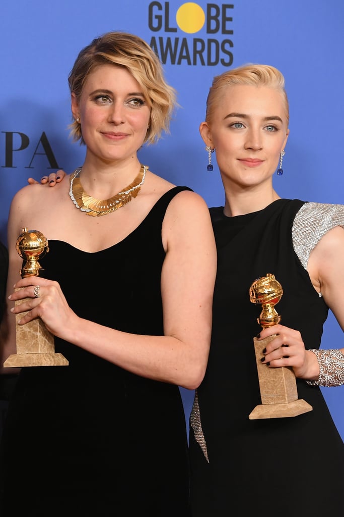 Greta and Saoirse took home awards for Lady Bird's best motion picture win at the Golden Globes.