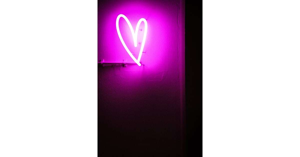 Neon heart shining in red  Free Stock Photo