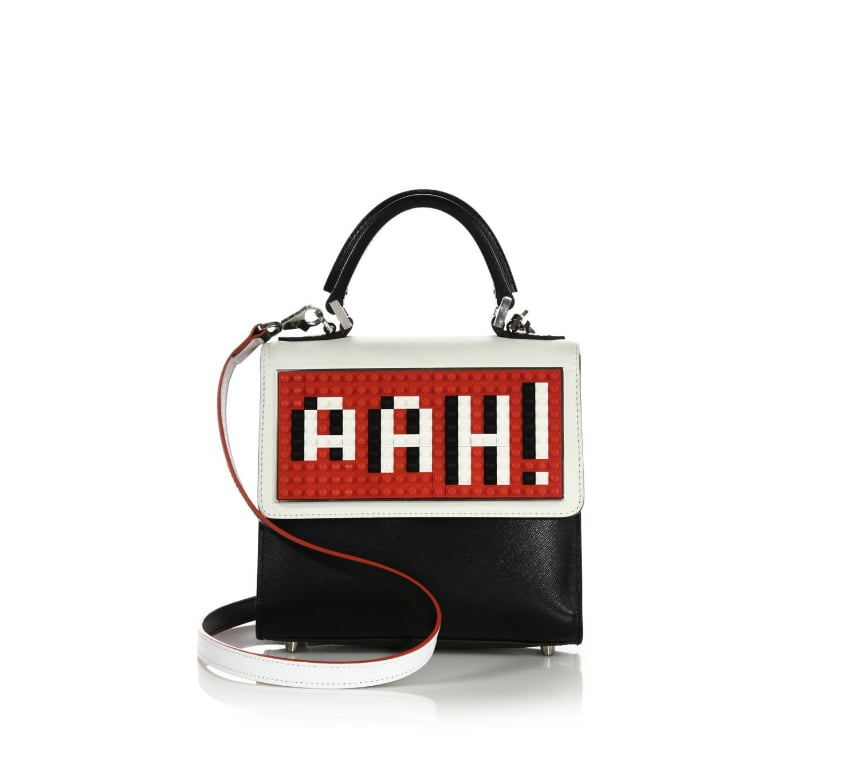 Between the clothes, the stars, and the crowds, this Les Petits Joueurs "Ahh" satchel ($970) sums up Fashion Week thoughts and will, no doubt, go well with a variety of different ensembles. 
— SS