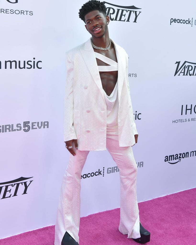 Lil Nas X Wears a White Balmain Pantsuit and Bandage Top