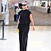 Rihanna Carrying Tiny Yellow Taxi Bag at Airport