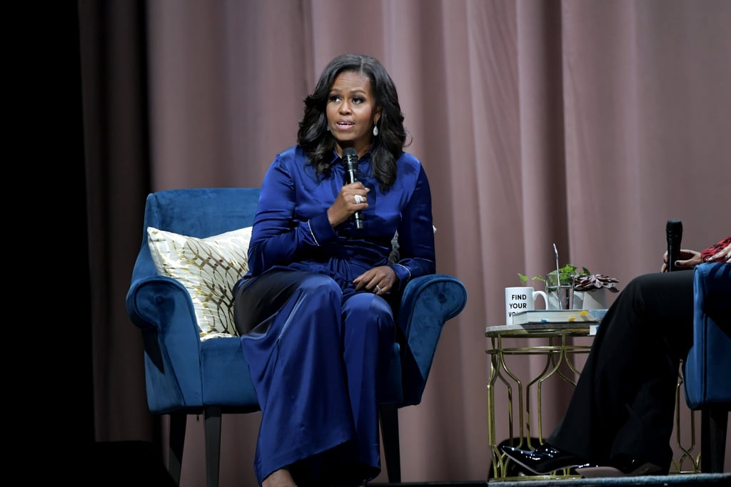 Michelle joined Michelle Norris on stage in Boston to promote her new book. For the event, she wore a silky Cushine jumpsuit in a vibrant blue hue. It featured a drawstring detail that cinched in her waist.