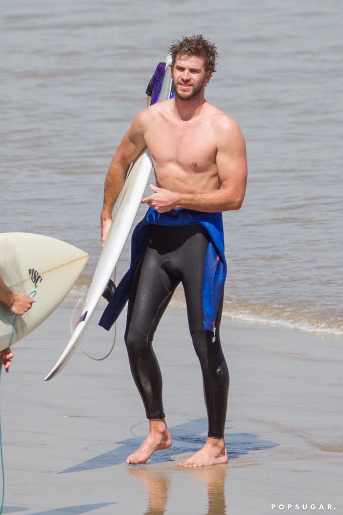 Liam Hemsworth Shirtless While Surfing in Australia