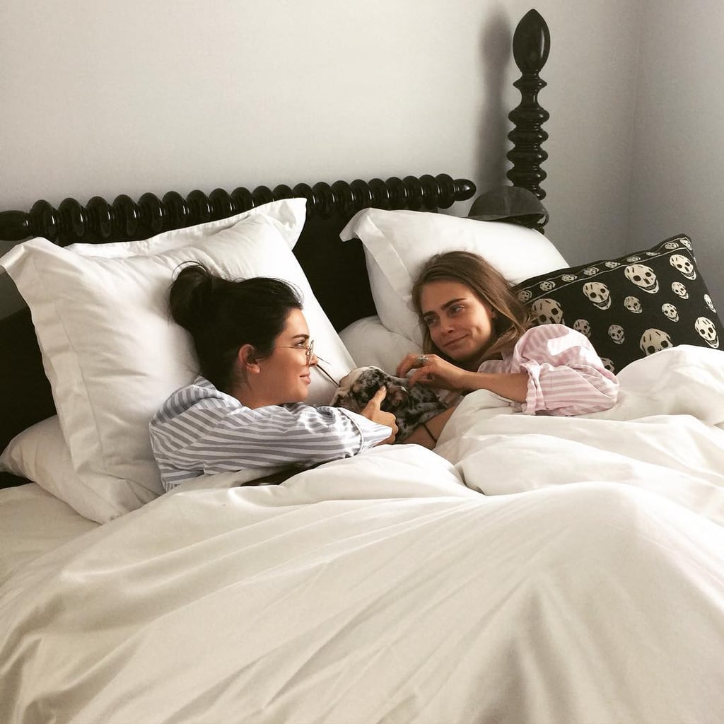 Kendall and Cara snuggled with Tyga's new puppy.