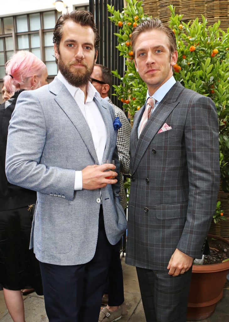 Henry Cavill and Dan Stevens compared pocket squares at the Dunhill and GQ party in 2015.