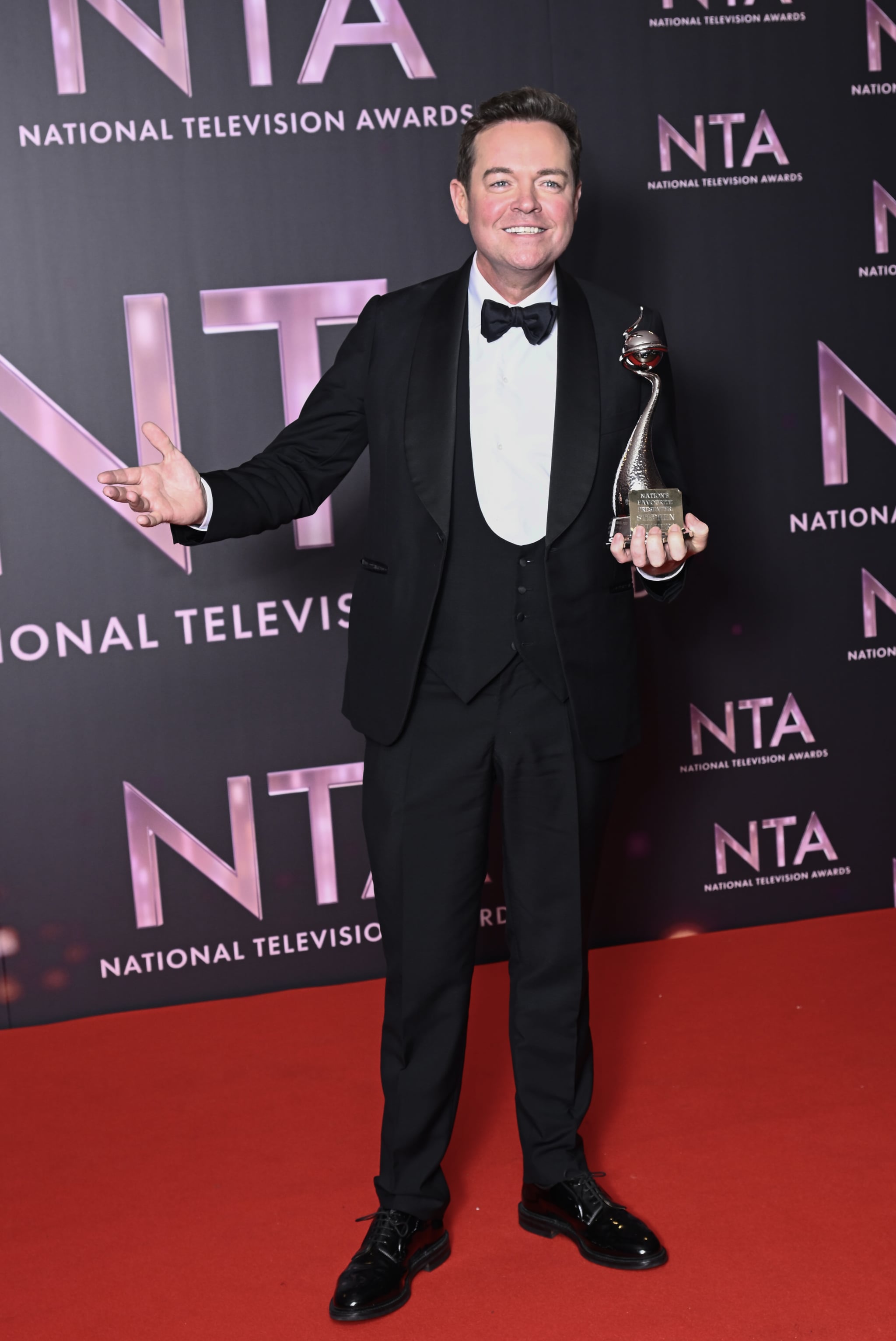 LONDON, ENGLAND - OCTOBER 13: Stephen Mulhern collects the Best TV Presenter award on behalf of Ant & Dec, in the winners' room at the National Television Awards 2022 at OVO Arena Wembley on October 13, 2022 in London, England. (Photo by Gareth Cattermole/Getty Images)